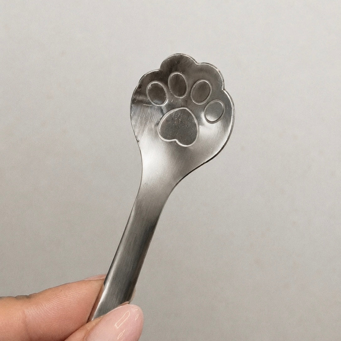 Lepel met pootafdruk