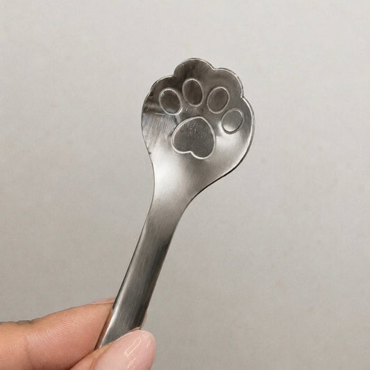 Lepel met pootafdruk
