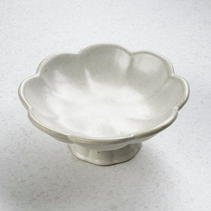 Verhoogde voerbak met bloemenrand