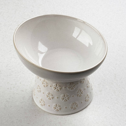 Verhoogde voerbak met bloemenmotief