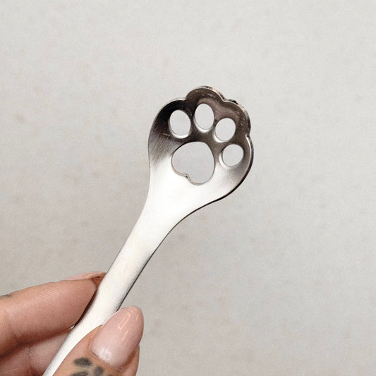 Lepel met pootafdruk
