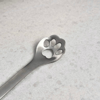 Lepel met pootafdruk